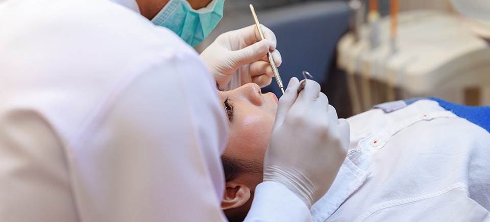 Patient getting root canal treatment in South Gate, California