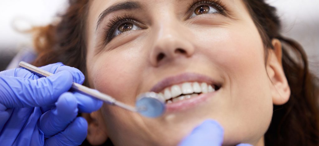 General Dentistry providing preventative dental care to patient